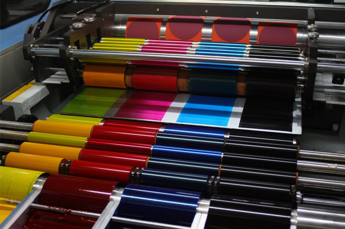  A color printing machine in a factory, producing vibrant prints efficiently